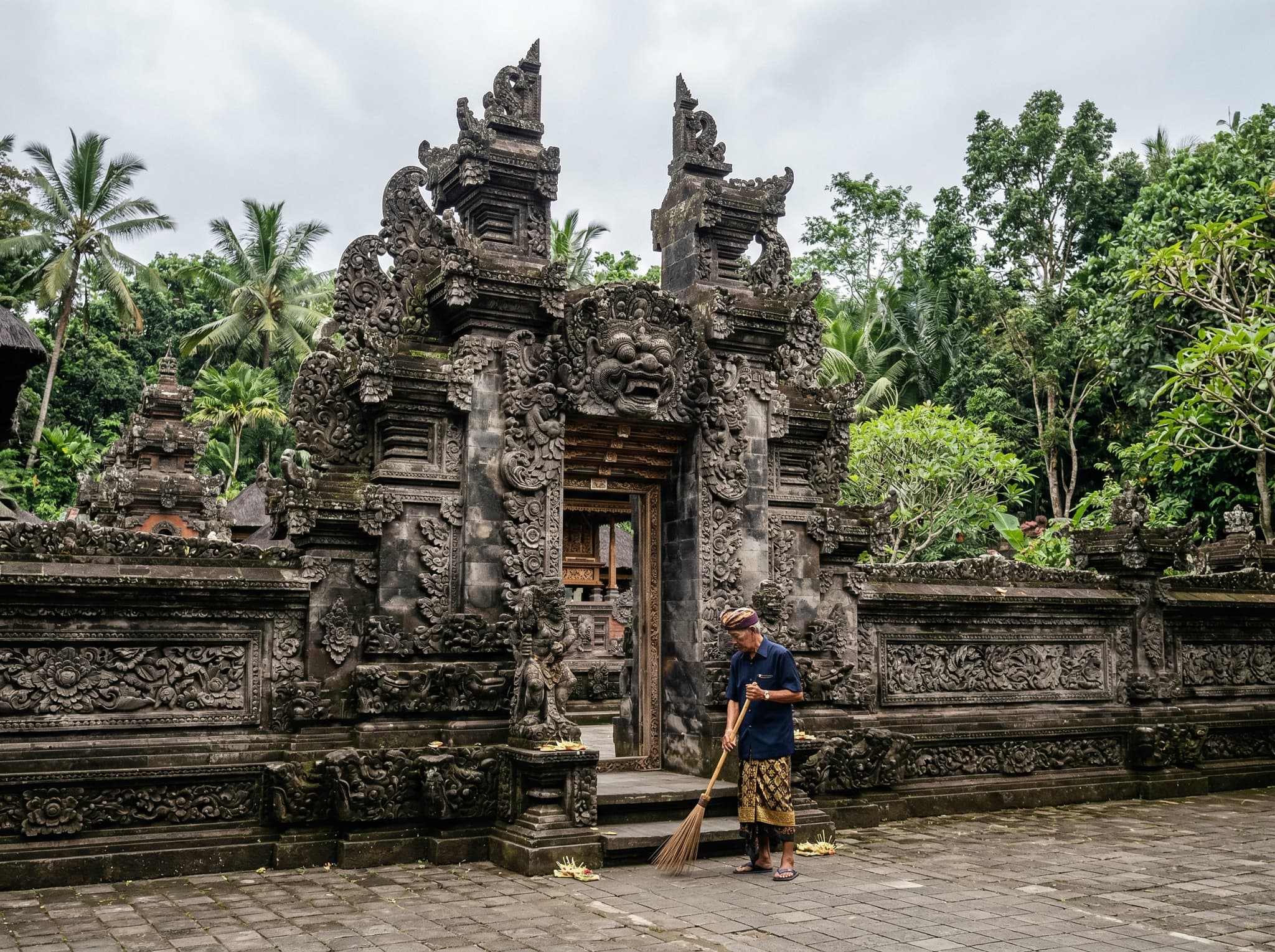 Batuan Temple exterior with intricate stone carvings — the ornate carved facade of Pura Puseh Batuan, illustrating the article's recommendation of Batuan as a separate destination with its own distinct artistic and architectural identity