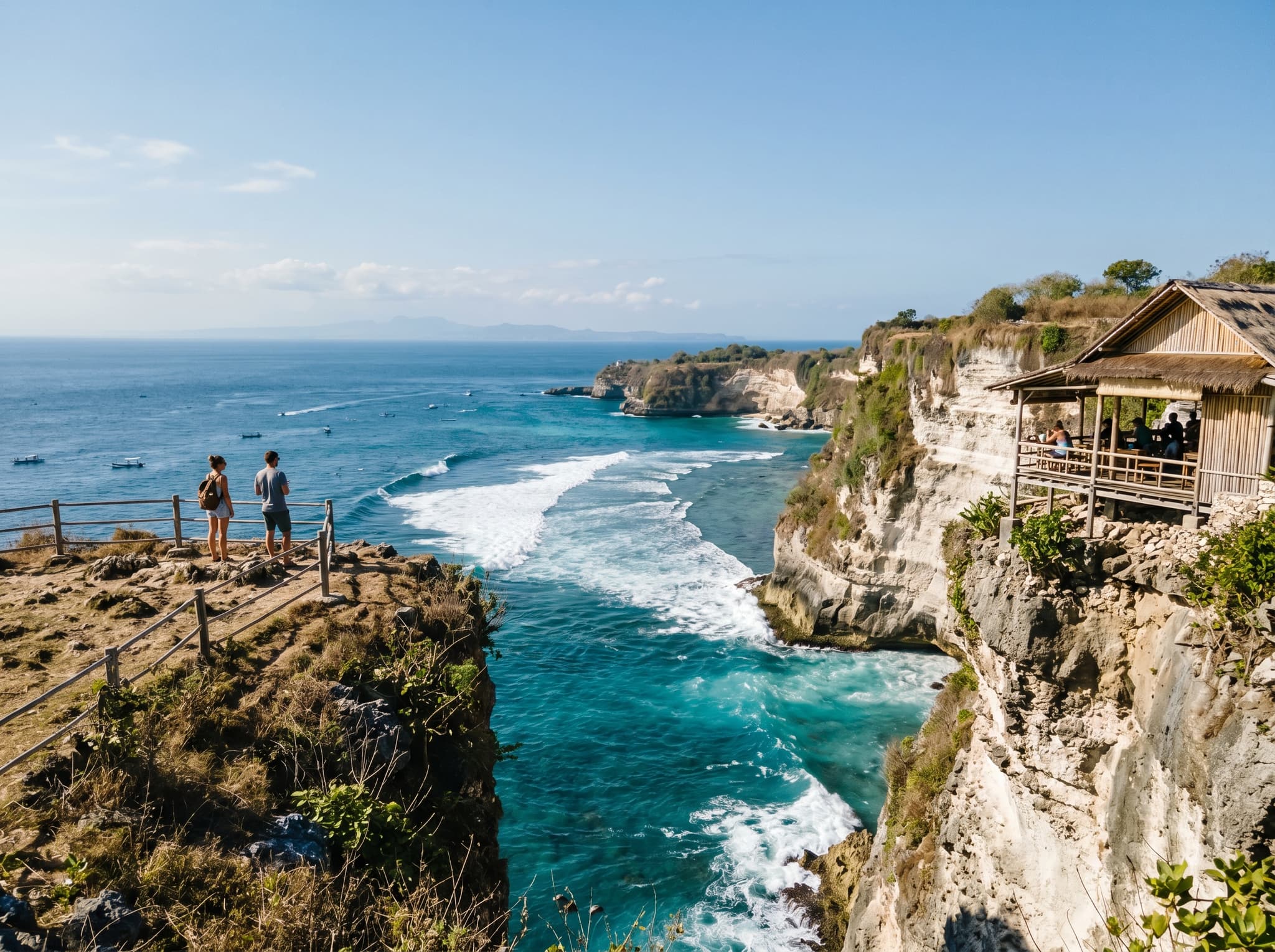 The limestone cliffs at Mahana Point on Nusa Ceningan, with the turquoise water below and a small warung visible at the cliff edge — showing the viewpoint directly above Ceningan Point where visitors can watch surfers and assess conditions