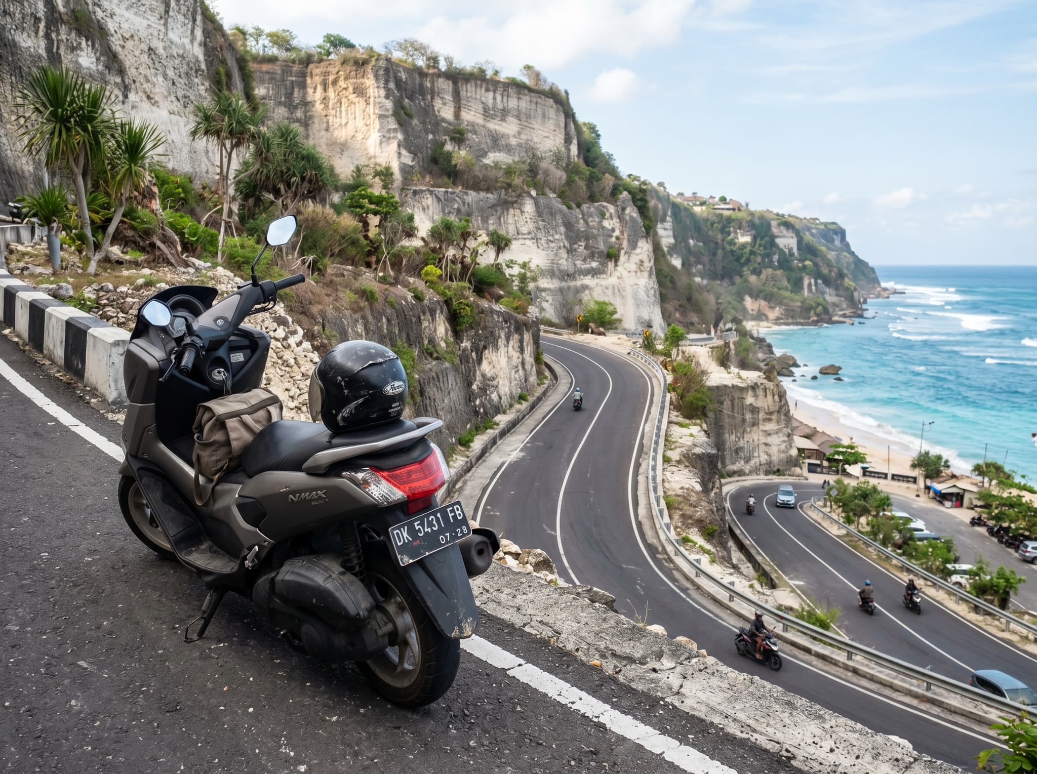 A motorbike or scooter parked near the Melasti Beach parking area or on the cliff road, with the beach visible below — illustrating the article's practical transport section and the point that scooter riders avoid the ride-share pickup restriction that catches many visitors off guard.