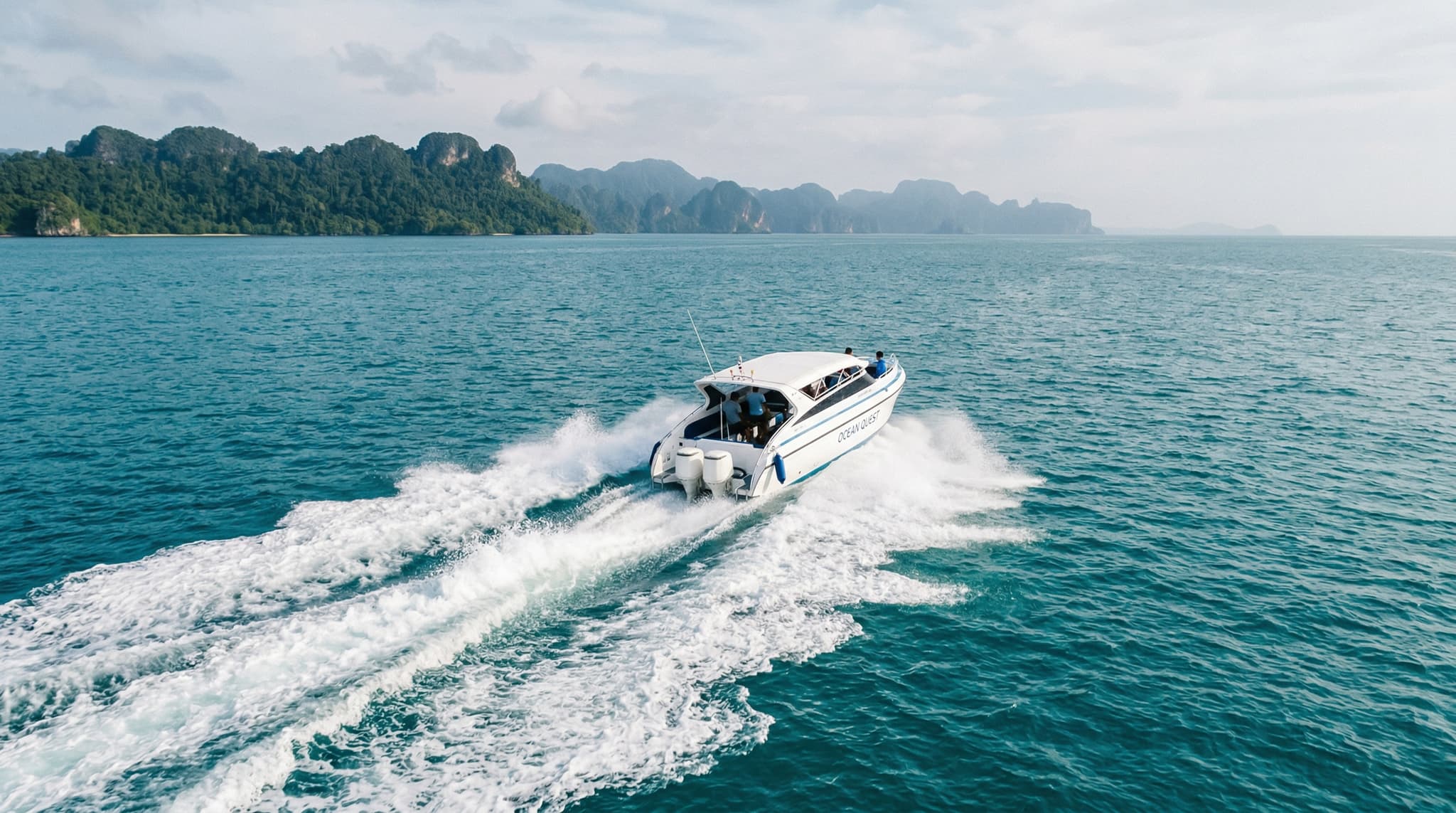A fast boat cutting across vivid turquoise water between Bali and one of its offshore islands, representing the day trip possibilities explored in this guide — the energy of departure, open sea, and the promise of somewhere new within reach.