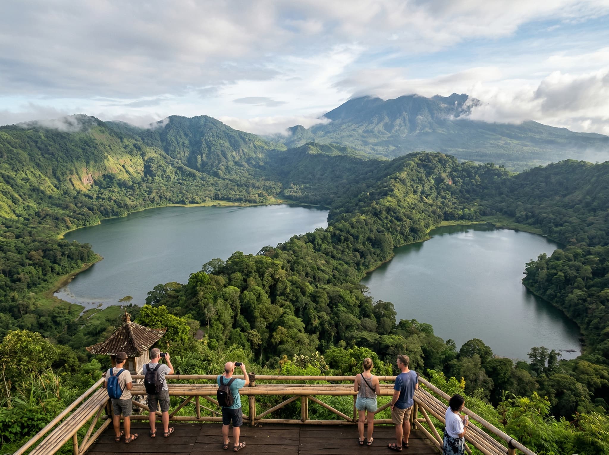 Wanagiri Hidden Hills viewpoint overlooking Lake Buyan and Lake Tamblingan in North Bali — the famous Twin Lakes panorama that the article recommends combining with a visit to Banyu Wana Amertha, as both are in the same village