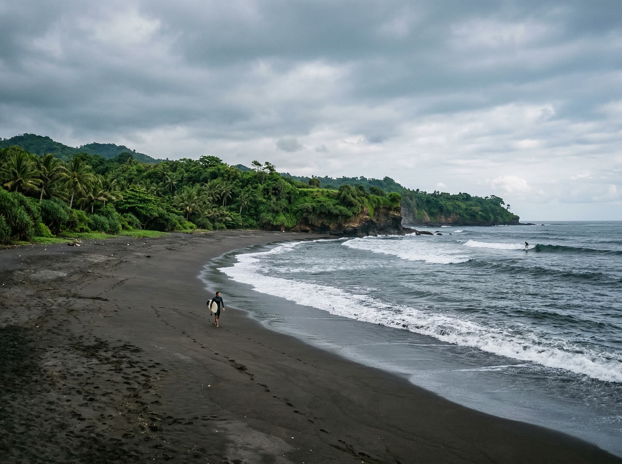 Balian Beach on Bali's northwest coast — a quiet, undeveloped black sand beach with light surf and few visitors, representing the solitude alternative the article recommends for travelers who find Echo Beach too crowded