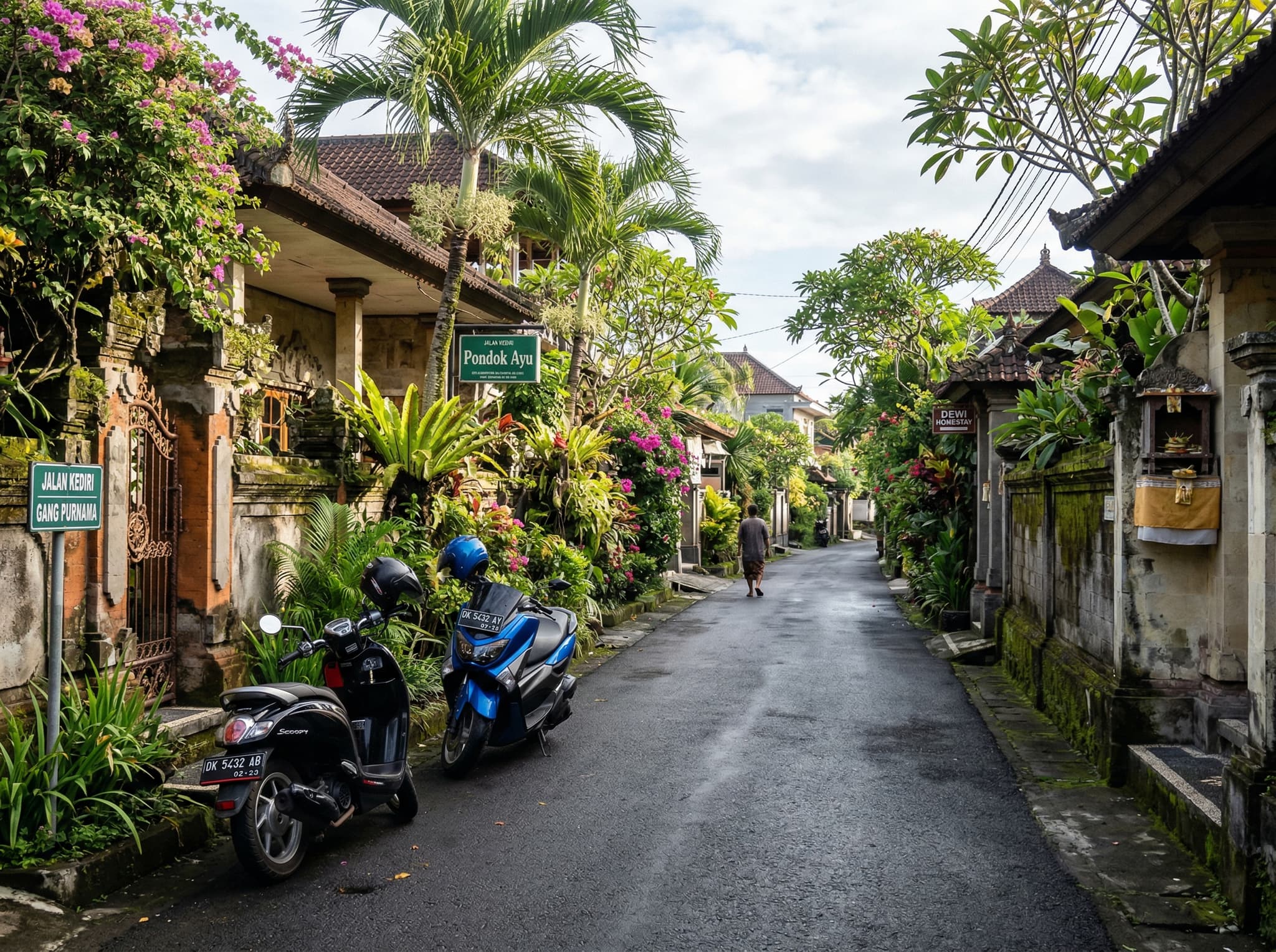A quiet lane in the Tuban or southern Kuta area near the airport showing resort-style accommodation and calmer streets, contrasting with central Kuta's congestion and illustrating the neighborhood comparison section