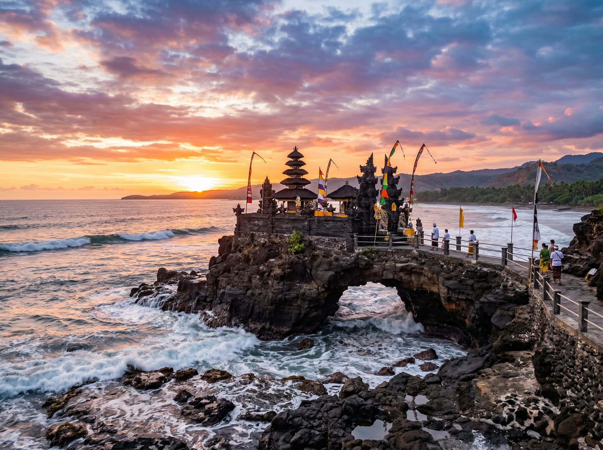Pura Batu Bolong temple on its rocky outcrop above the sea at sunset, south of Senggigi — the small Hindu temple built over a natural hole in the rock, one of Lombok's most photographed spots