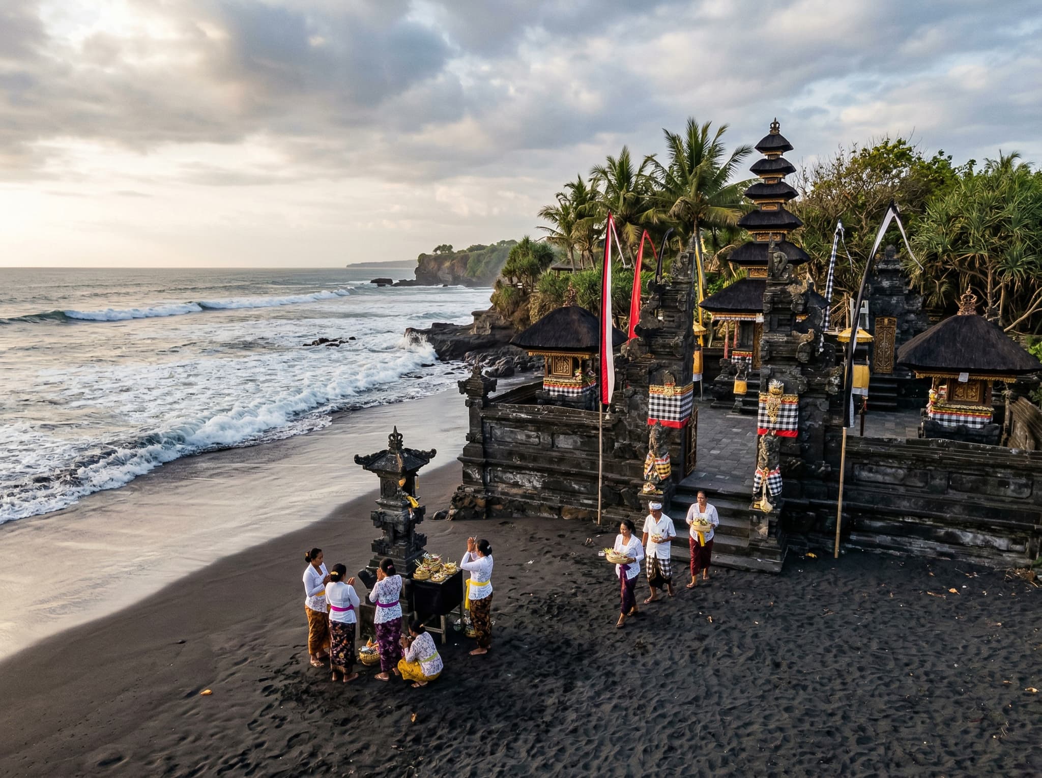 Pura Masceti temple on the black sand beach near Keramas — one of Bali's nine directional kahyangan jagat temples, shown in its coastal setting to convey its role as a working sacred site rather than a tourist attraction