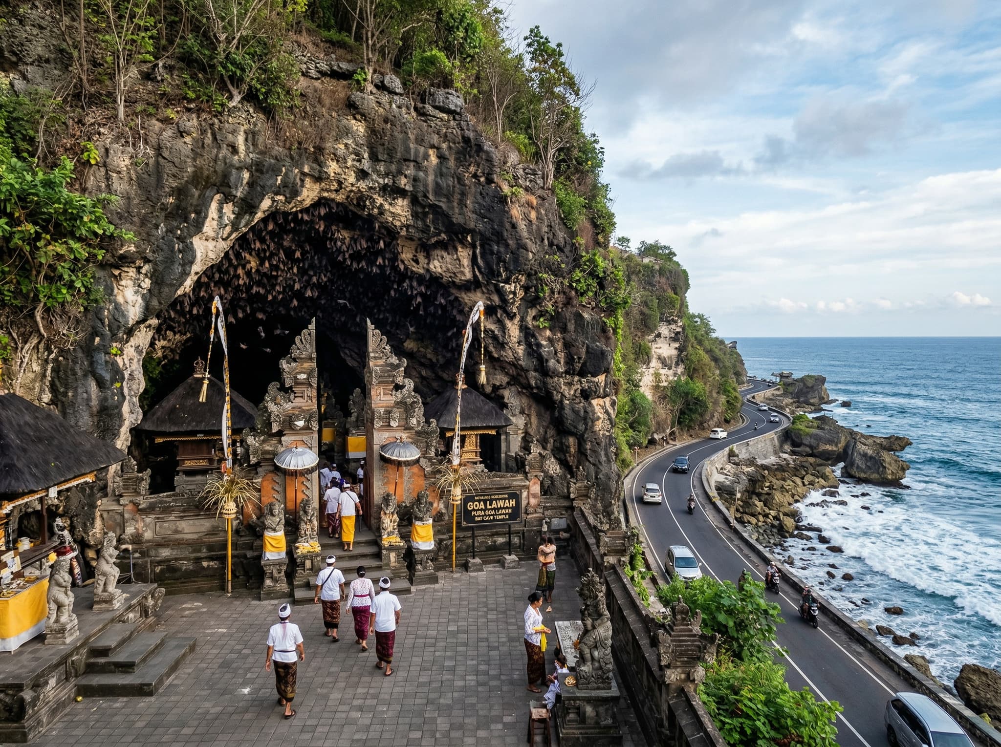 Goa Lawah Bat Cave Temple on Bali's east coast road — the dramatic temple entrance built into a cliff face with bats visible, representing a worthwhile side trip 30 minutes east of Keramas along the coastal road